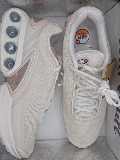 Nike Air Max Dn in a white and metallic silver