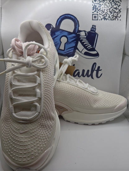 Nike Air Max Dn in a white and metallic silver