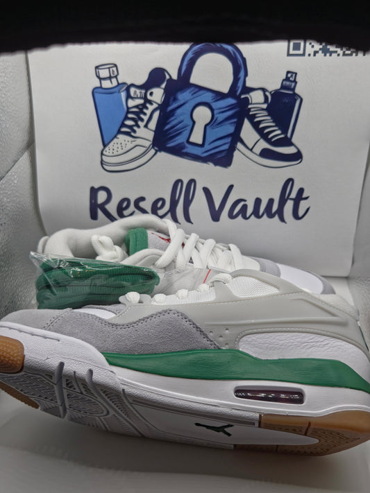 Jordan Air 4 RM sneakers in a White, Pine Green, and Neutral Grey